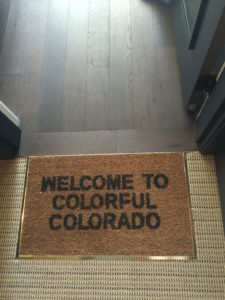 Unique doormats found at every room door at Halcyon Hotel - Welcome to Colorful Colorado 